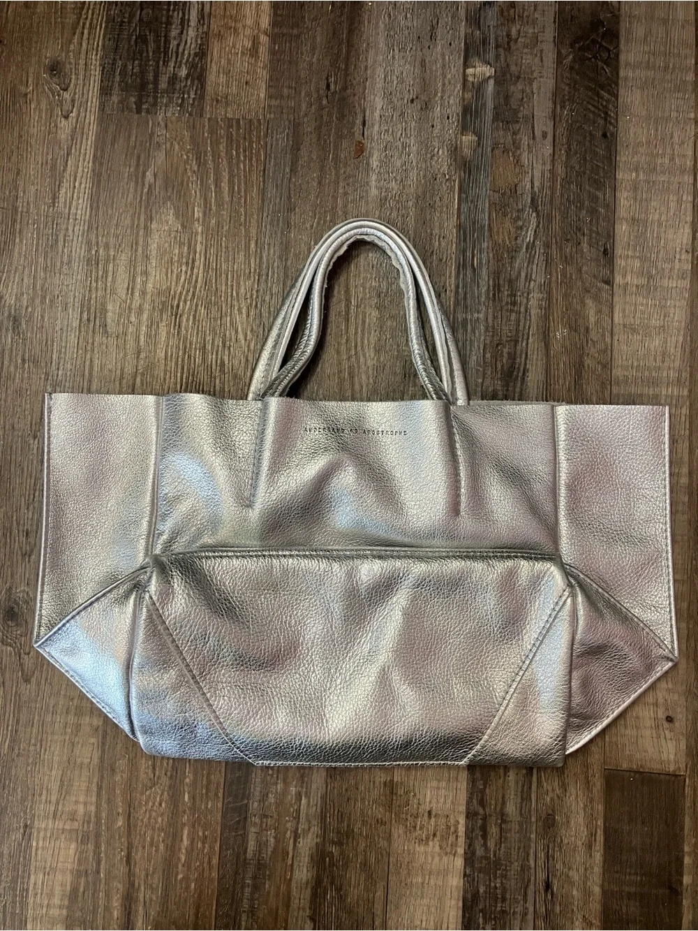 Ampersand As Apostrophe Sideways leather tote bag in a metallic silver finish